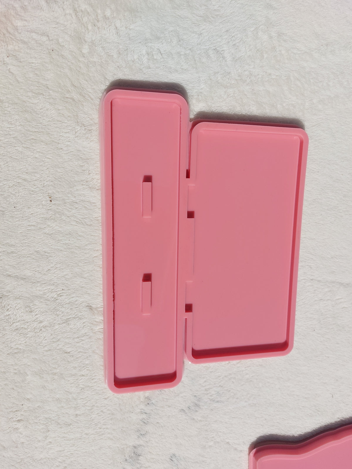 A silicone mold used for making welcome signs, desk plaques, desk calendars, earring organizers, accessories and decorations, nameplates, logos, small picture frames, light bases, or souvenirs. Designed for casting resin, wax, or ceramic