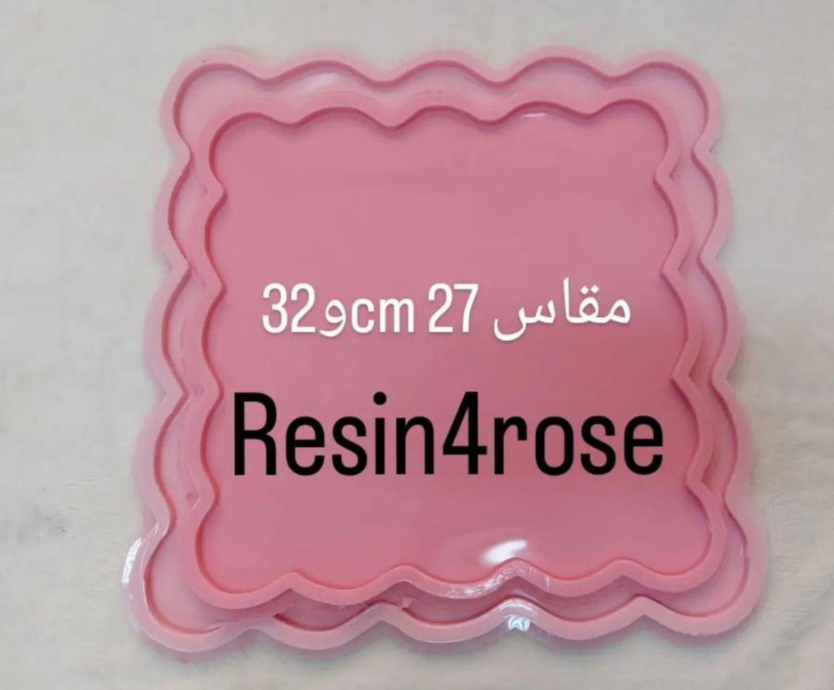 This silicone mold features a square design with regularly wavy or serrated edges, giving the cast item an aesthetically pleasing appearance resembling flower borders. Available in 3 different sizes.