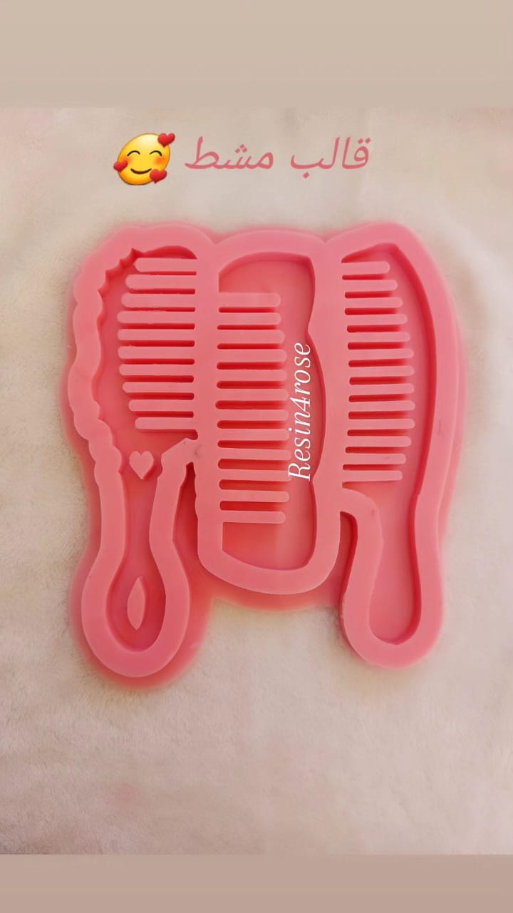 A silicone mold designed for resin work or crafts, intended for casting various hair comb shapes.