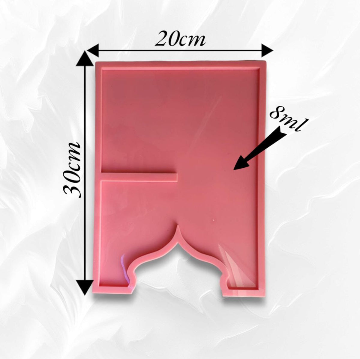 This silicone mold features a unique design combining a rectangular geometric shape with an Islamic arch (mihrab) at the base, making it suitable for creating a Quran stand. Available in two different sizes