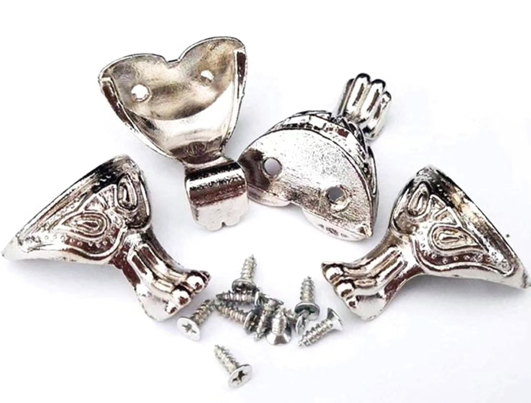 Decorative metal corner leg set. These legs are used as support and lifting bases for wooden boxes, jewelry boxes, or large resin and acrylic bases