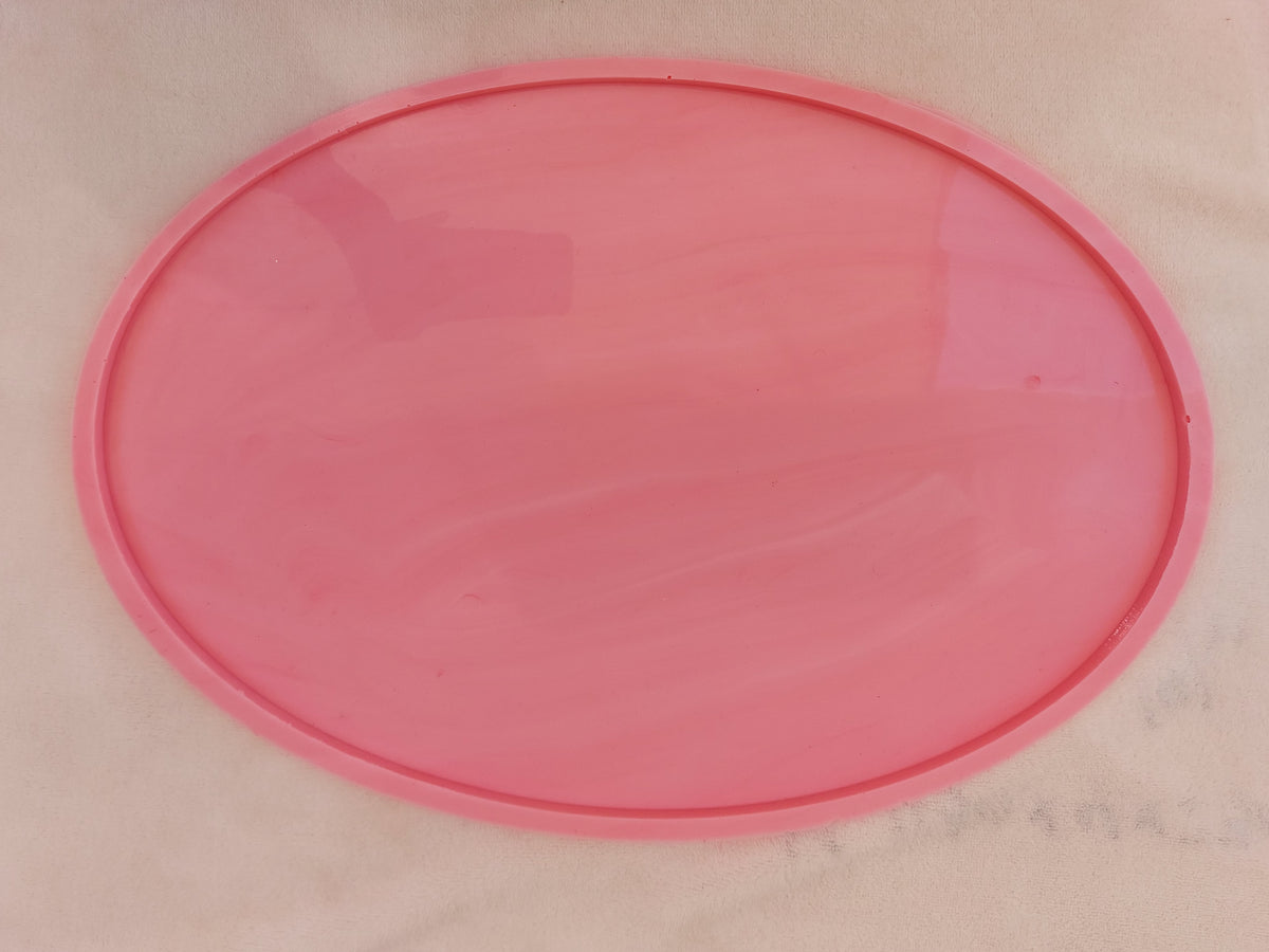 A oval silicone mold designed for crafts and resin, wax, or pottery making. Ideal for making medium-sized serving trays, large coasters, or as a base for displaying jewelry and accessories size 43*30 cm .