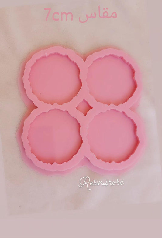 This silicone mold is specially designed for craft projects such as resin, wax, or pottery casting. The mold consists of four interconnected cavities, resembling flower petals, each measuring 7 x 7 cm and 8 mm deep