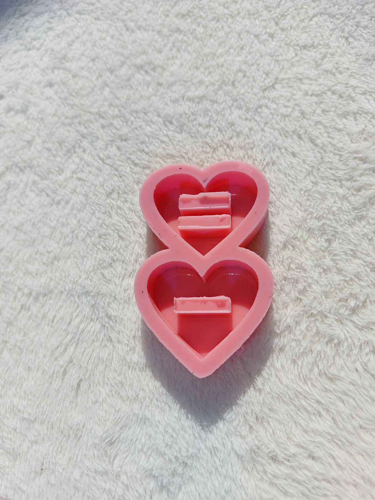 Silicone molds are ring holder stands in various shapes (hexagonal, circular, square, or heart-shaped) and are used for casting resin, wax, pottery, or polymer clay.