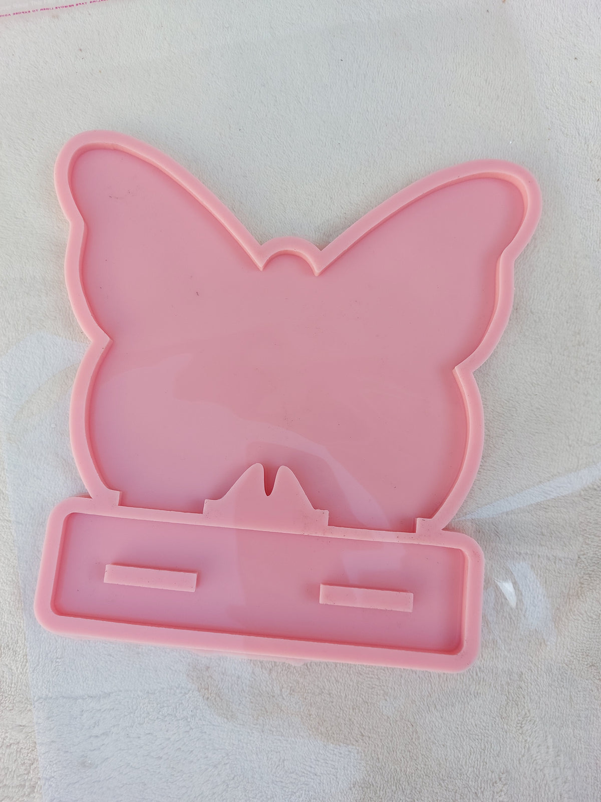 A silicone mold used to make earring organizers, accessories, welcome signs, desk boards, desk calendars, decorations, nameplates, logos, small picture frames, light bases, or souvenirs. Designed for casting resin, wax, or ceramic
