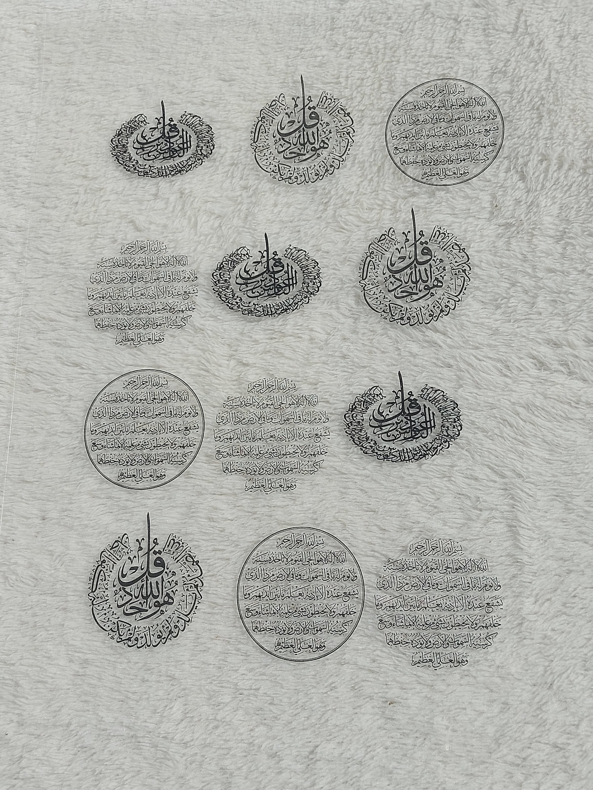 Transparent printed paper or stickers containing Quranic verses and prayers. This type of repeated text is used to be placed inside the included resin molds, or to be glued onto car pendants and medals as handicrafts