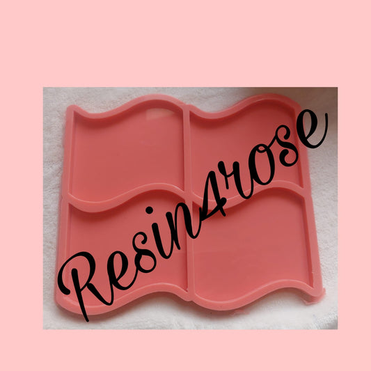 This silicone mold features a unique design resembling four interlocking wavy flags or a window shape with smooth edges, specifically designed for craft projects such as casting resin, polymer clay, wax, or pottery. Dimensions: 10 x 8 cm