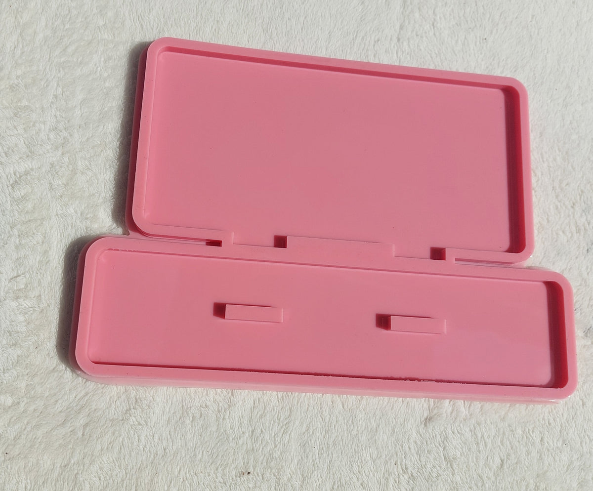 A silicone mold used for making welcome signs, desk plaques, desk calendars, earring organizers, accessories and decorations, nameplates, logos, small picture frames, light bases, or souvenirs. Designed for casting resin, wax, or ceramic