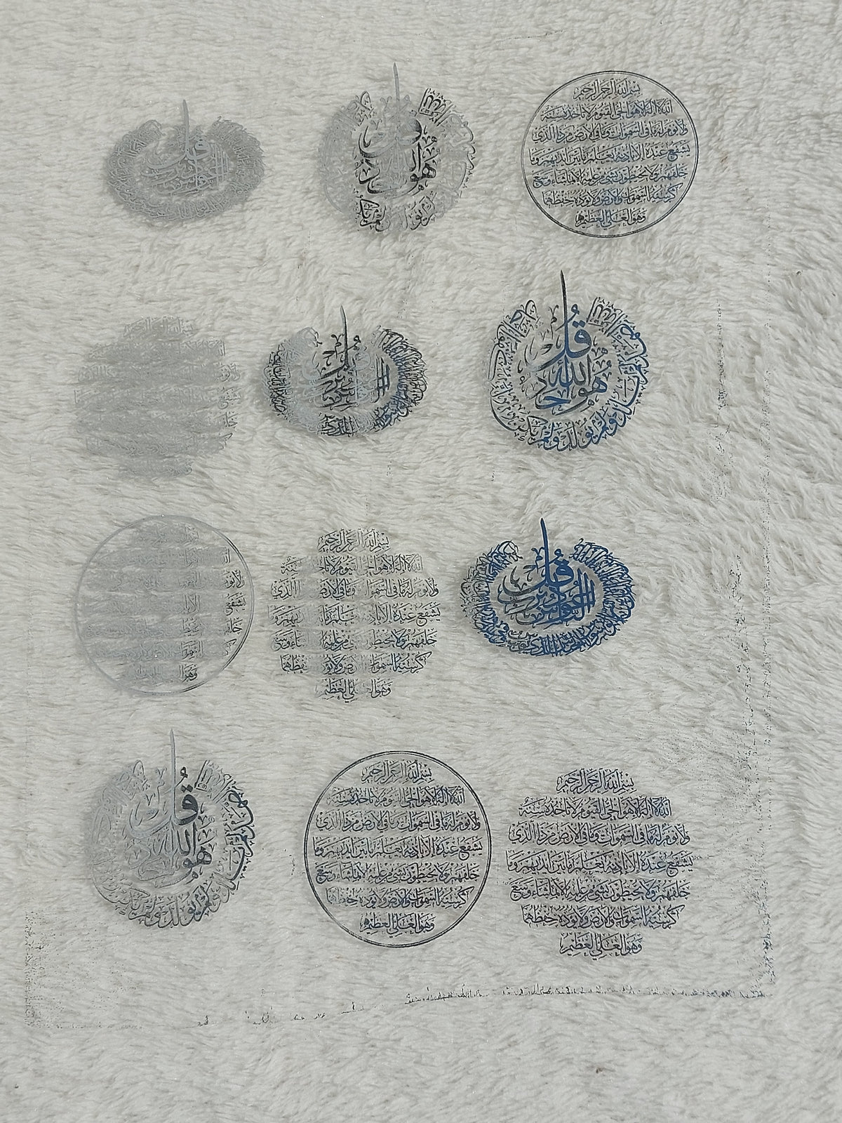 Transparent printed paper or stickers containing Quranic verses and prayers. This type of repeated text is used to be placed inside the included resin molds, or to be glued onto car pendants and medals as handicrafts