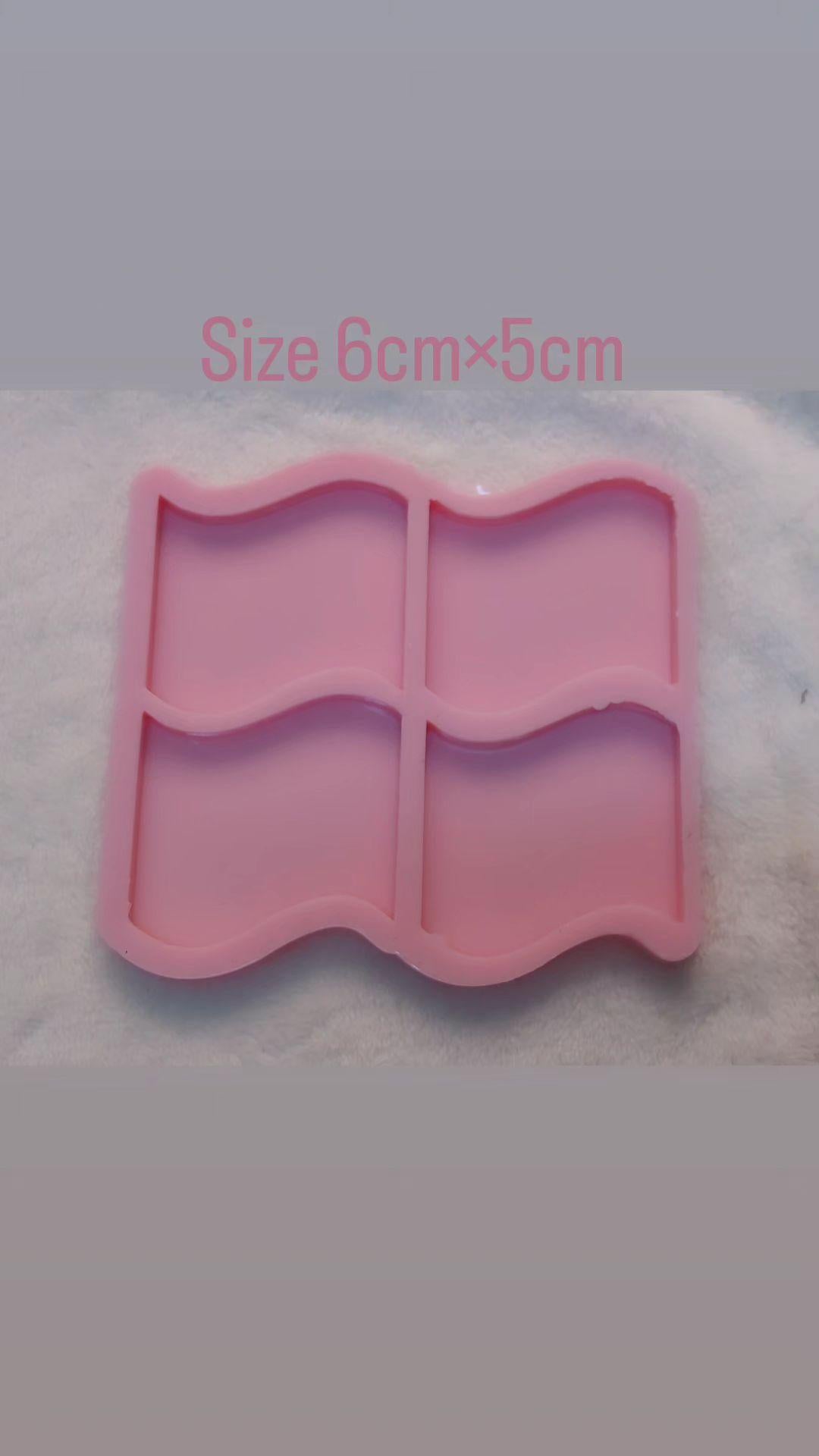 This silicone mold features a unique design resembling four interlocking wavy flags or a window shape with smooth edges, and is specifically designed for craft projects such as casting resin, polymer clay, wax, or pottery. Available in two different sizes