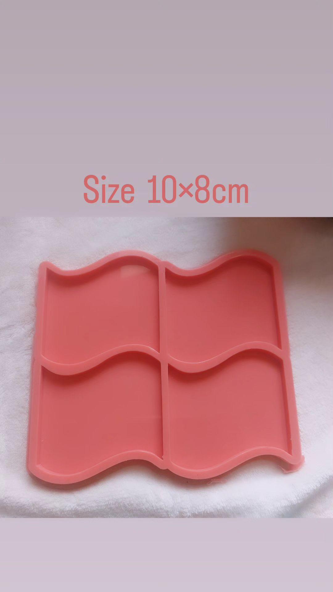 This silicone mold features a unique design resembling four interlocking wavy flags or a window shape with smooth edges, and is specifically designed for craft projects such as casting resin, polymer clay, wax, or pottery. Available in two different sizes