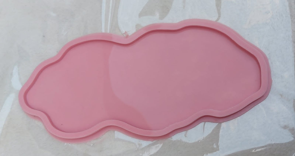 A free-form, wavy silicone mold featuring irregular, flowing edges resembling clouds or natural rock formations. Size: 15*35 cm