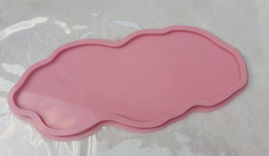 A free-form, wavy silicone mold featuring irregular, flowing edges resembling clouds or natural rock formations. Size: 15*35 cm