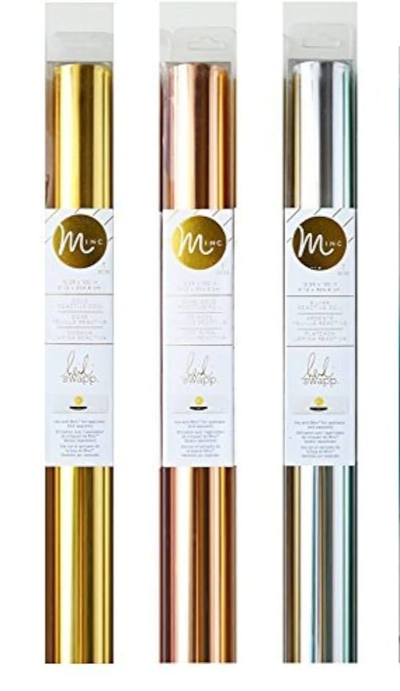 A set of high-quality adhesive vinyl rolls for precisely cutting logos, phrases, and stickers before sticking them onto various surfaces such as glass, acrylic, or incorporating them into resin pieces