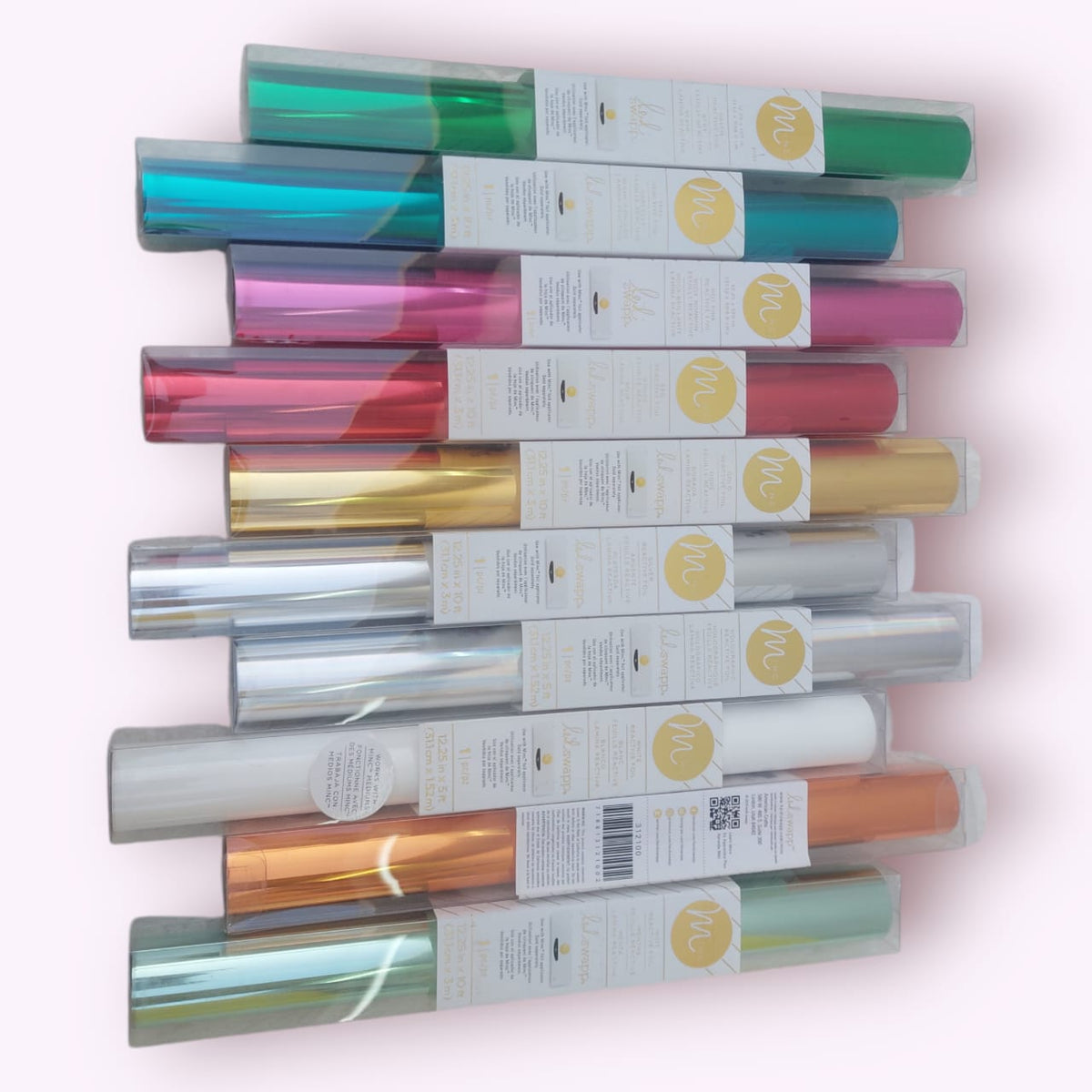 A set of high-quality adhesive vinyl rolls for precisely cutting logos, phrases, and stickers before sticking them onto various surfaces such as glass, acrylic, or incorporating them into resin pieces
