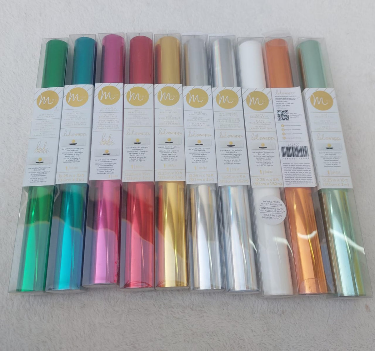 A set of high-quality adhesive vinyl rolls for precisely cutting logos, phrases, and stickers before sticking them onto various surfaces such as glass, acrylic, or incorporating them into resin pieces