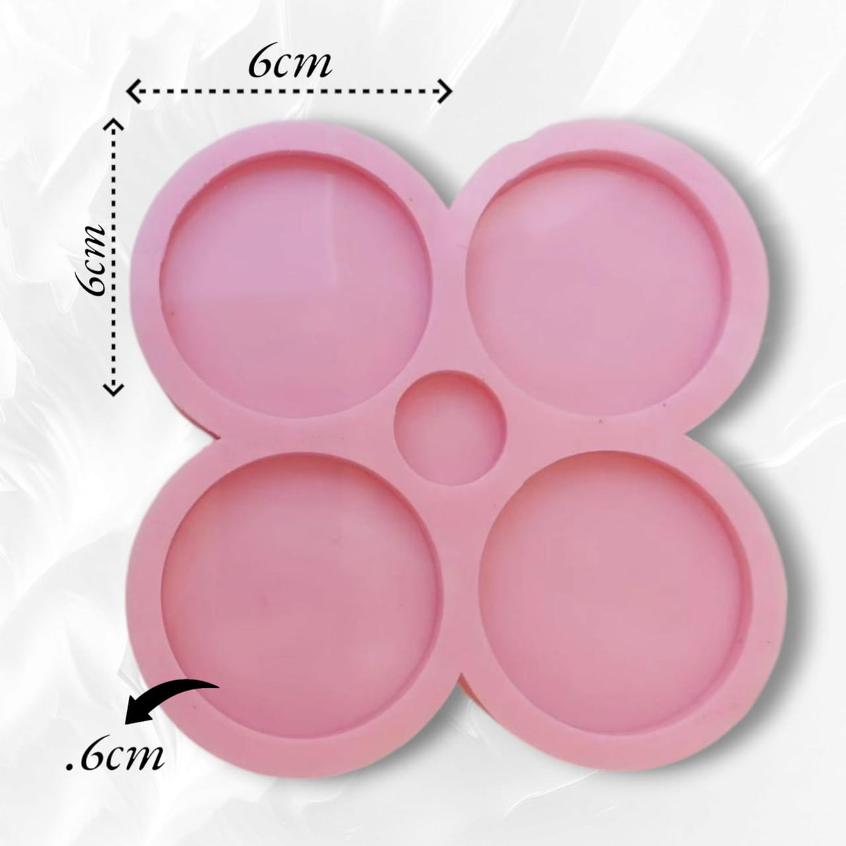 This silicone mold is specially designed for craft projects such as resin, wax, or pottery casting. The mold consists of four interconnected cavities, resembling flower petals, each measuring 6 x 6 cm and 6 mm deep