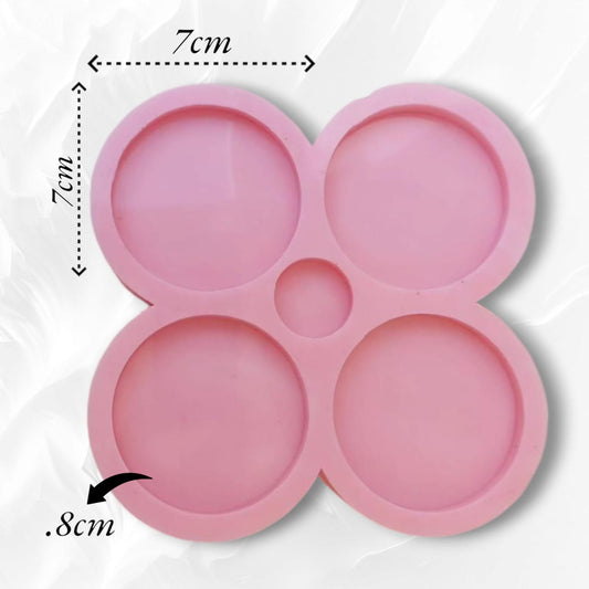 This silicone mold is specially designed for craft projects such as resin, wax, or pottery casting. The mold consists of four interconnected cavities, resembling flower petals, each measuring 7 x 7 cm and 8 mm deep