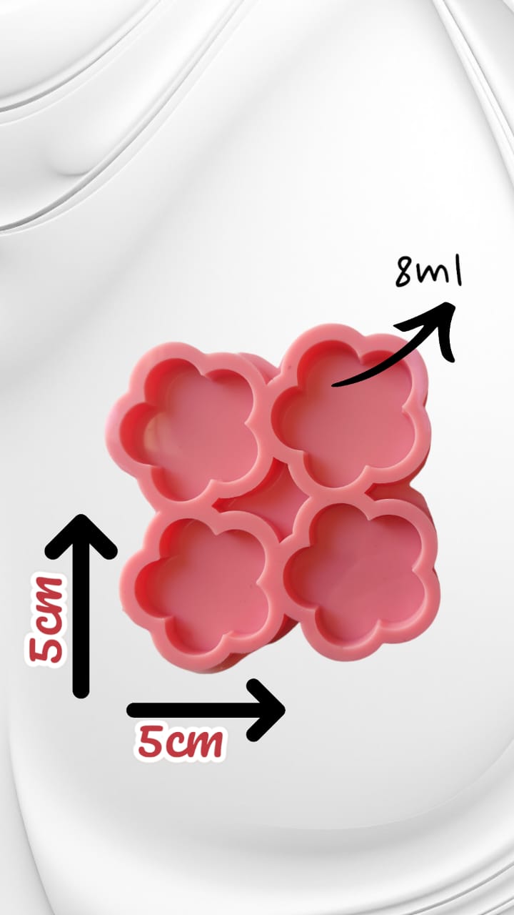 A silicone mold designed for crafts such as casting resin, polymer clay, or wax. It features four interconnected cavities, each designed in the shape of a five-petaled rose with smooth, rounded edges. Size: 5 cm