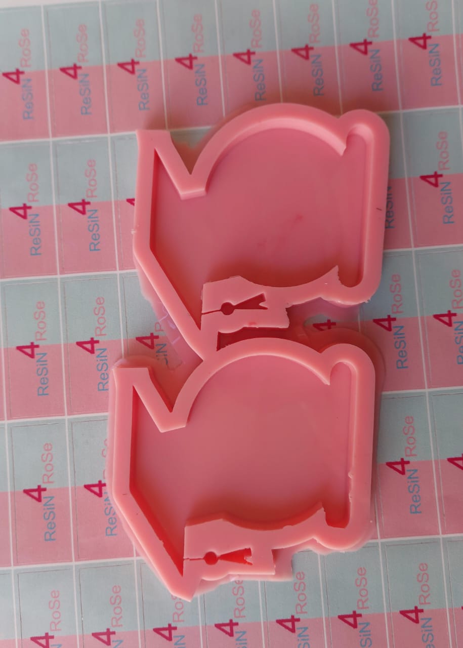 A silicone mold designed for crafts such as resin casting, polymer clay, or wax. The mold has two connected cavities, each designed in the shape of a graduation cap. Size: 8*6 cm