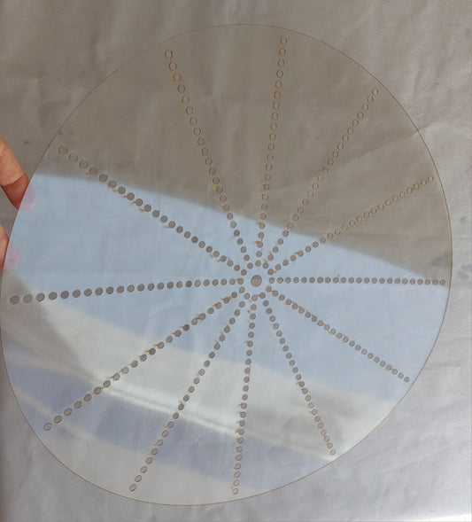 A very distinctive and clever tool (distribution/organization ruler) designed specifically to help craftspeople and watchmakers pinpoint the locations of numbers and lines with extreme precision without the hassle of manual measurement.