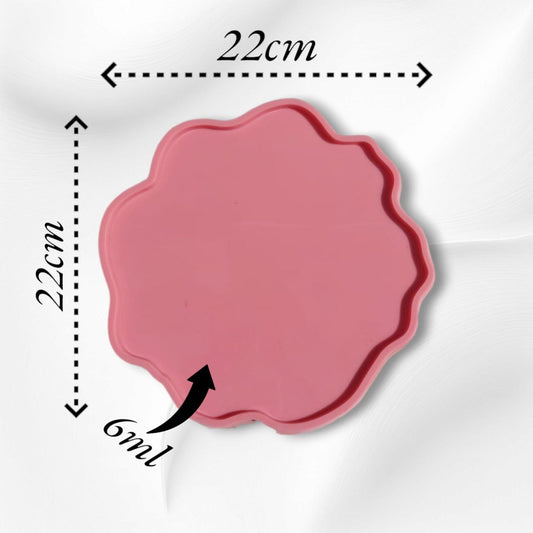 Round, wavy silicone mold for making large coasters, small round serving trays, or round art pieces from resin, wax, or ceramic. Available in 3 different sizes.