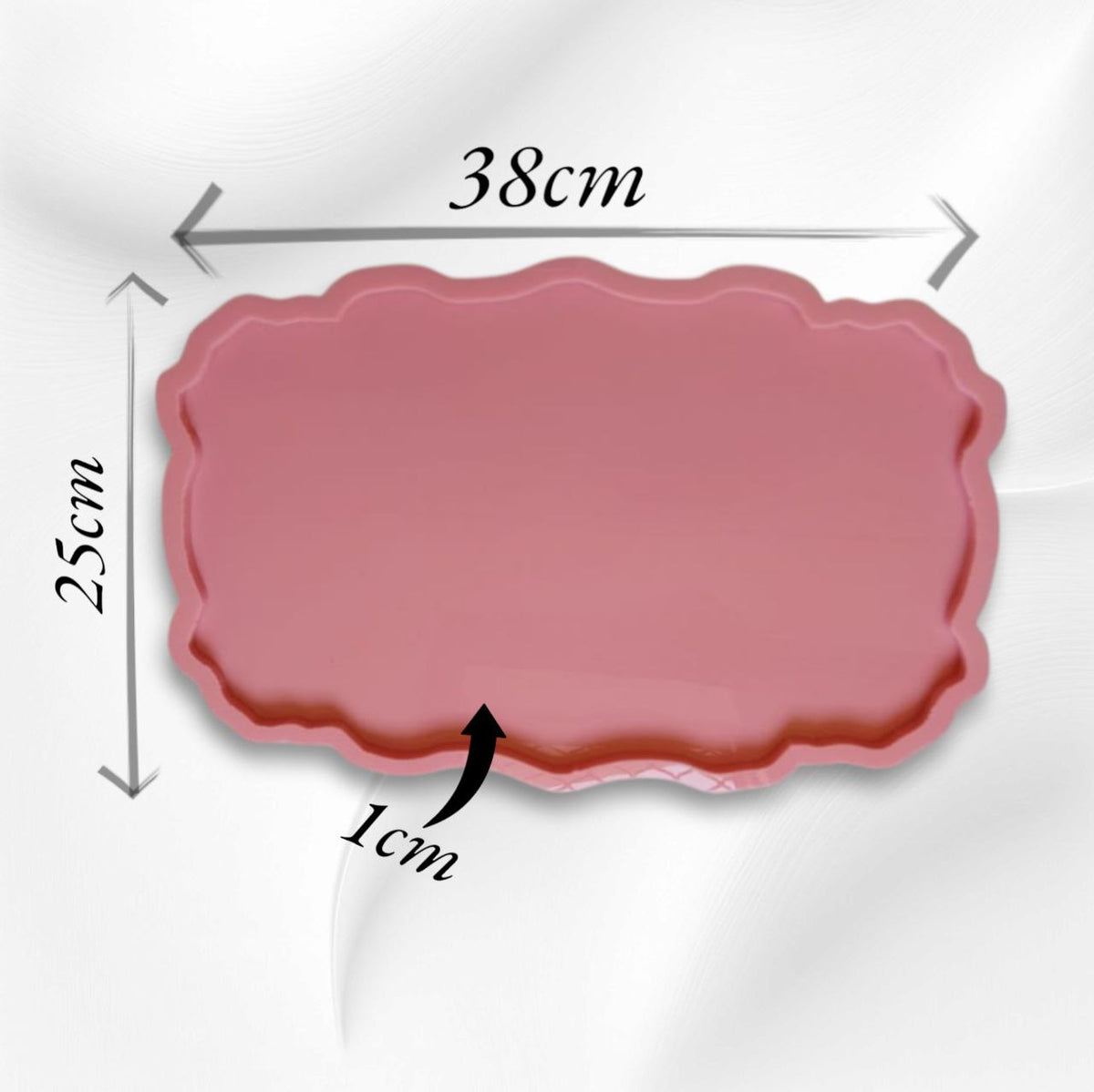 A rectangular silicone mold with wavy and curved edges, ideal for artwork such as resin, candles, or pottery. Available in two different sizes.