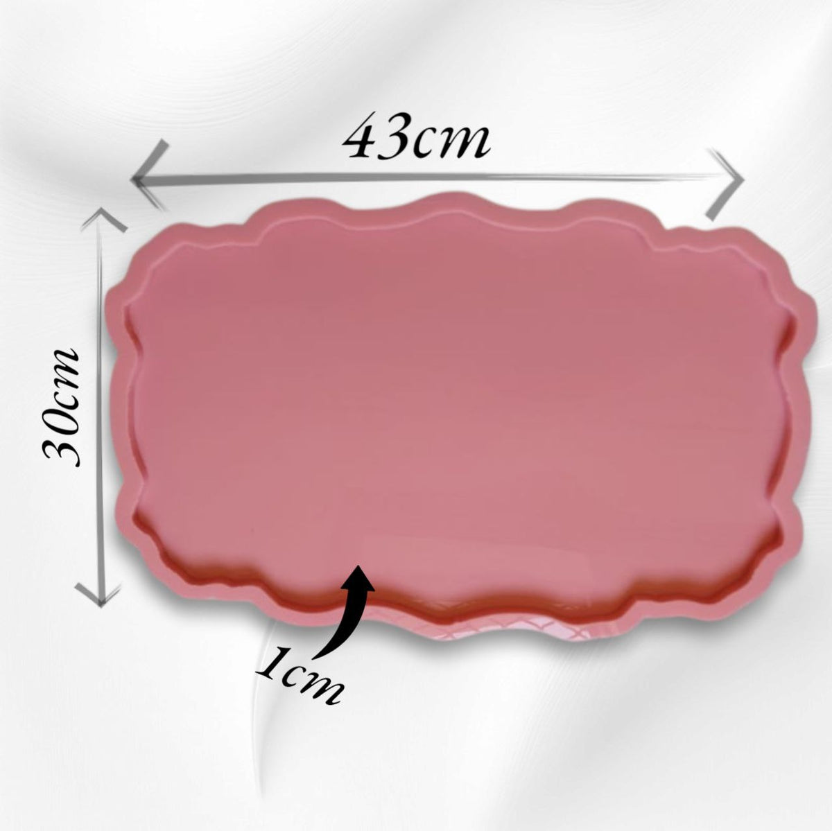 A rectangular silicone mold with wavy and curved edges, ideal for artwork such as resin, candles, or pottery. Available in two different sizes.