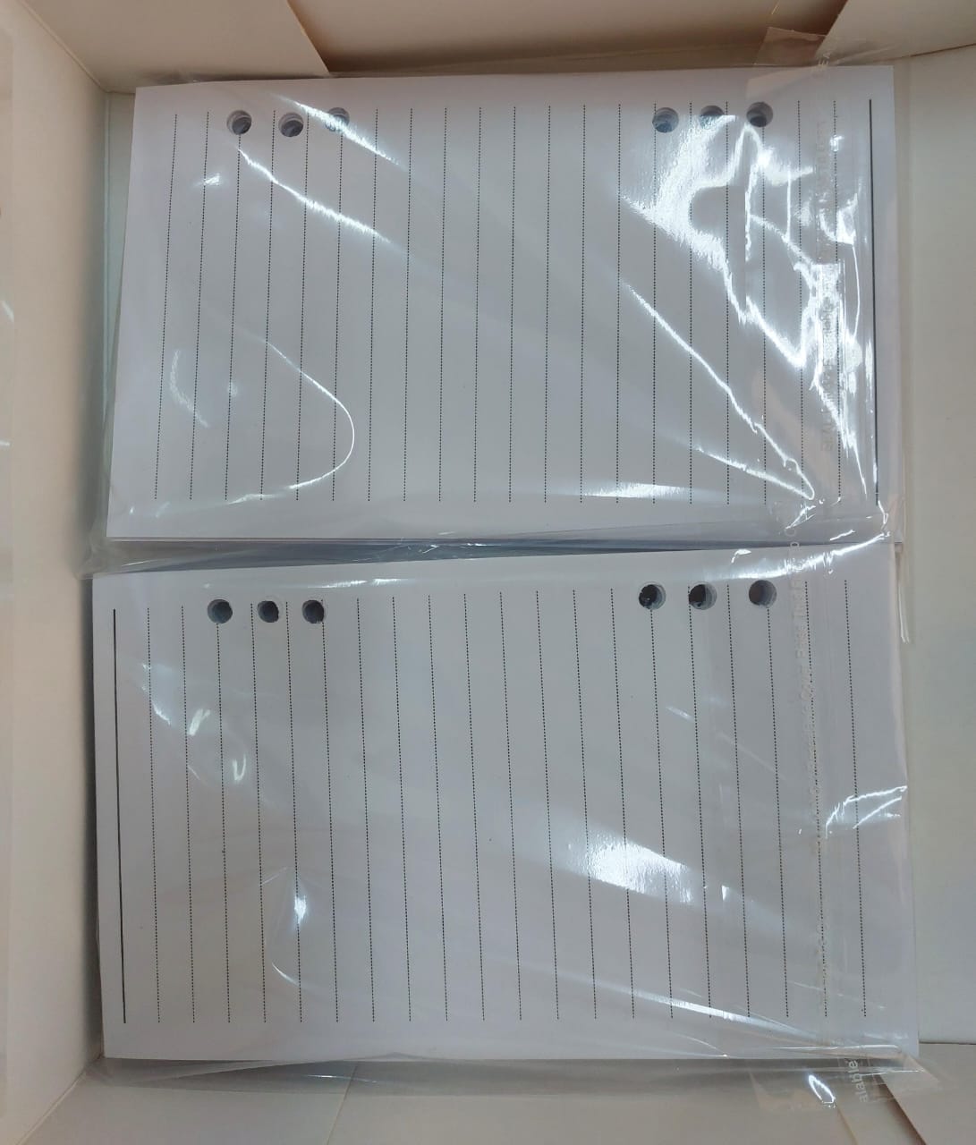 Custom-designed paper sets compatible with ring binders and planners. The papers are individually laminated for protection and thoughtfully designed to provide a smooth and organized writing experience, helping you easily sort ideas and tasks