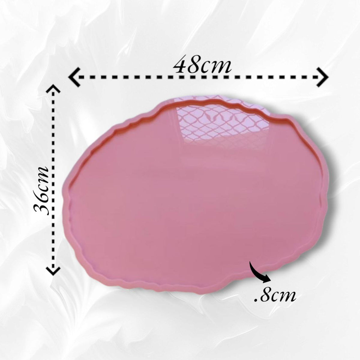 A silicone mold with irregular, wavy edges, typically used for casting resin or pottery to create large serving trays. Length: 48 cm, Width: 36 cm, Depth: 8 mm