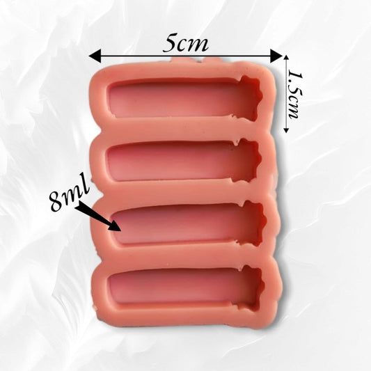 A silicone mold with four cavities in one, designed for making brooches or bookmarks using resin, wax, plaster, or ceramic.  Size: 5 x 1.5 cm