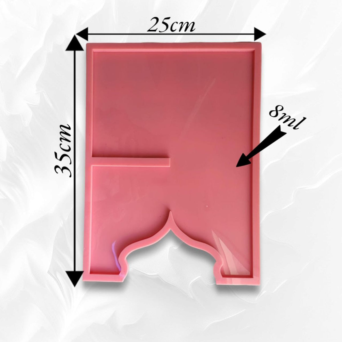 This silicone mold features a unique design combining a rectangular geometric shape with an Islamic arch (mihrab) at the base, making it suitable for creating a Quran stand. Available in two different sizes