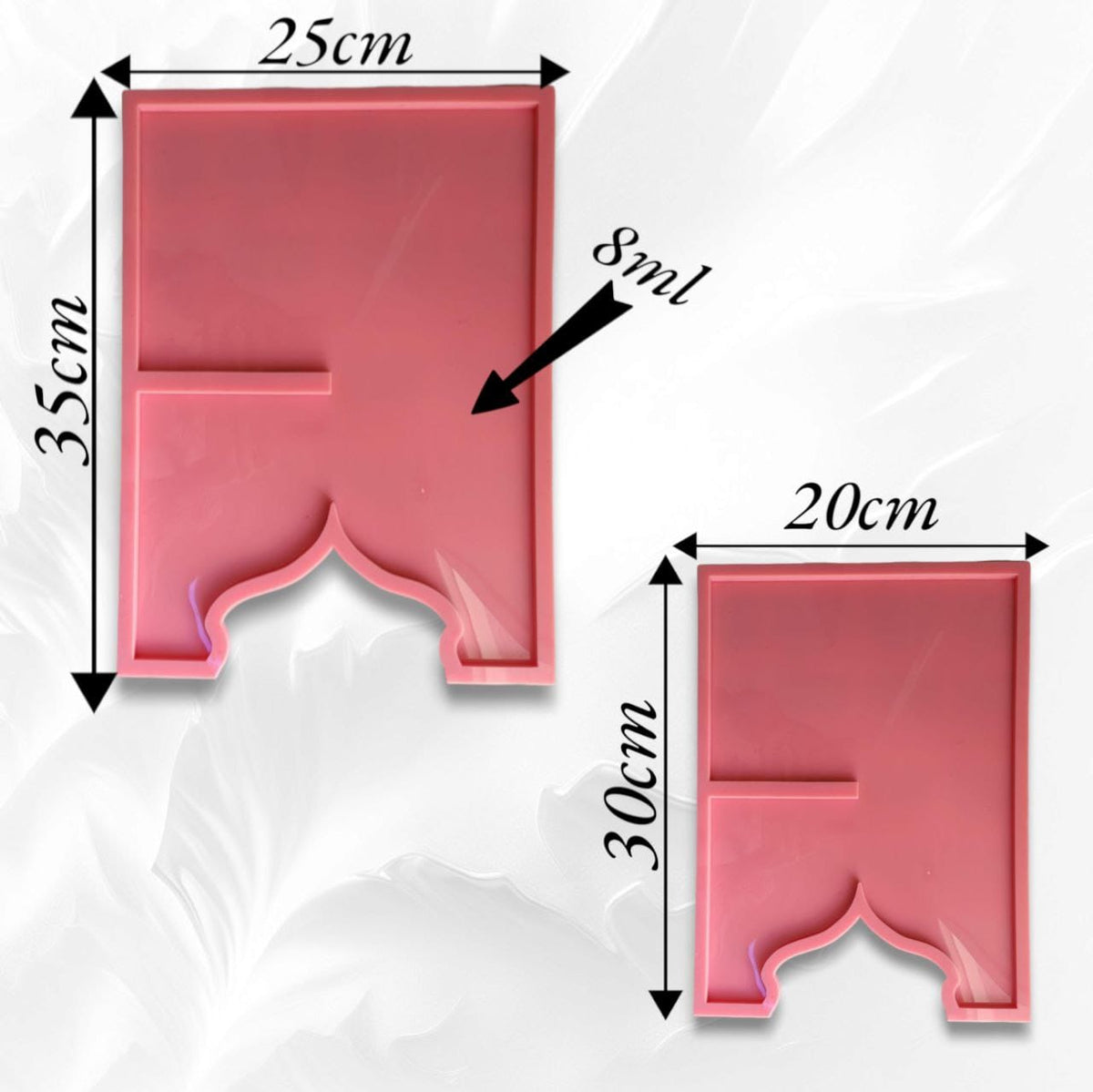 This silicone mold features a unique design combining a rectangular geometric shape with an Islamic arch (mihrab) at the base, making it suitable for creating a Quran stand. Available in two different sizes