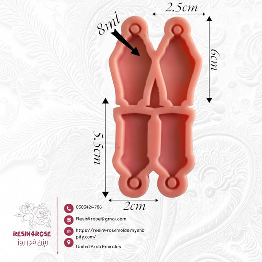 A silicone mold with four different shaped cavities designed to create decorative elongated shapes, often used as pendants, earrings, or necklaces. It can be used for casting resin, wax, pottery, or plaster. The mold comes in two different sizes