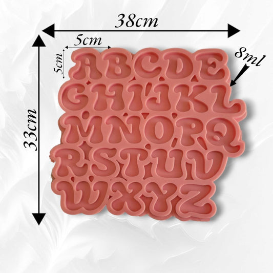 A silicone mold designed for casting the English letters from A to Z. Each letter is 5 cm long and 5 cm wide. It can be used for teaching children, making name pendants, or decorative items. Mold dimensions: 33 x 38 cm