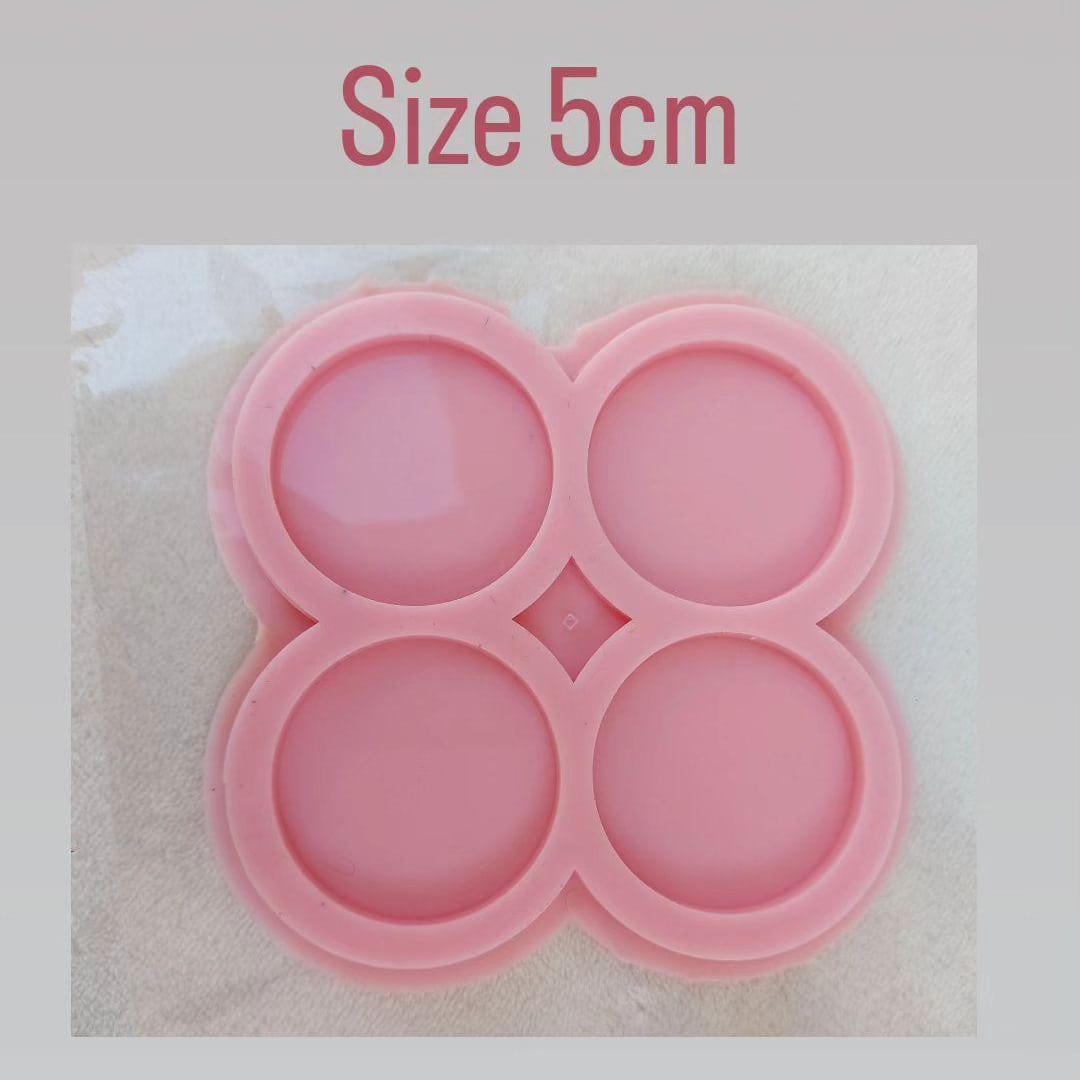 This silicone mold is specially designed for craft projects such as resin, wax, or pottery casting. The mold consists of four interconnected cavities, resembling flower petals, and is available in 3 different sizes.