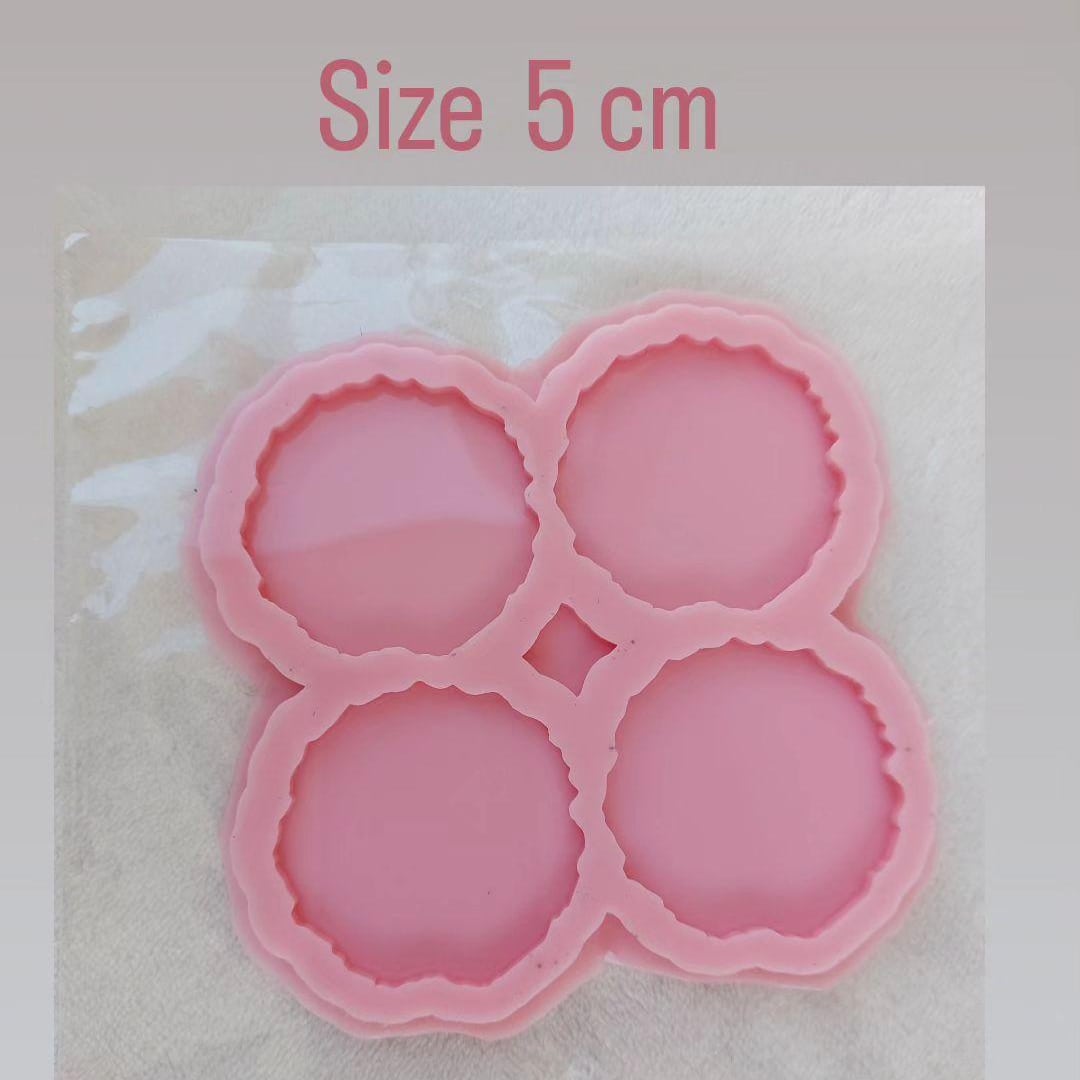 This silicone mold is specially designed for craft projects such as resin, wax, or pottery casting. The mold consists of four interconnected cavities, resembling flower petals, and is available in four different sizes.