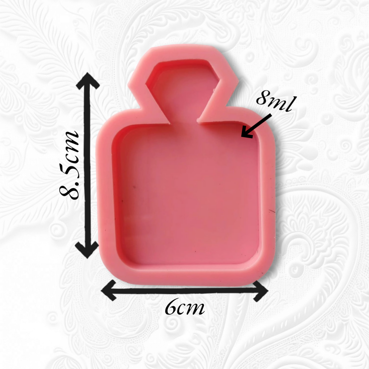 This large, flat, single-cavity silicone mold, designed in the shape of a classic perfume bottle, is perfect for making small, elegant coasters, large pendants, or decorative vanity pieces after casting with resin, wax, plaster, or ceramic