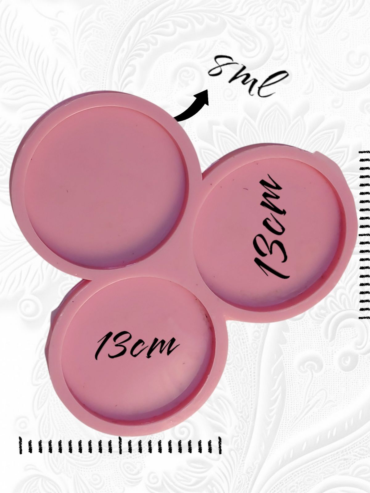 This silicone mold is specially designed for crafting projects such as casting resin, wax, or pottery. The mold consists of three interconnected circular cavities, each with a diameter of 9 cm and a depth of 8 mm.