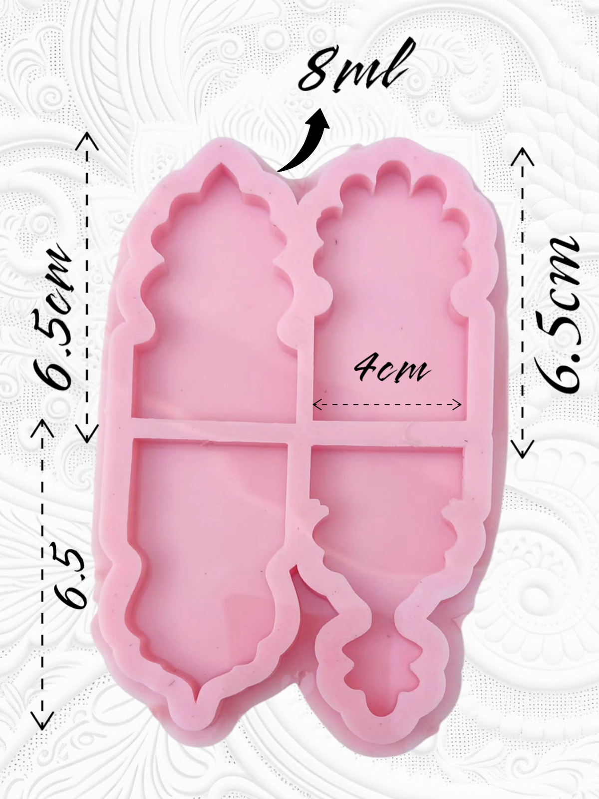 A silicone mold used for casting resin, wax, or pottery, designed to create small and varied art pieces with oriental or Islamic decorative details. It is divided into four cavities of different shapes. size 6.5*4 cm