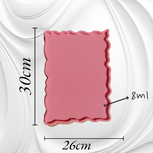 A rectangular silicone mold with irregular, wavy edges, commonly used for making trays and crafts such as casting resin, plaster, or pottery. Dimensions: 30*26 cm, Depth: 8 mm