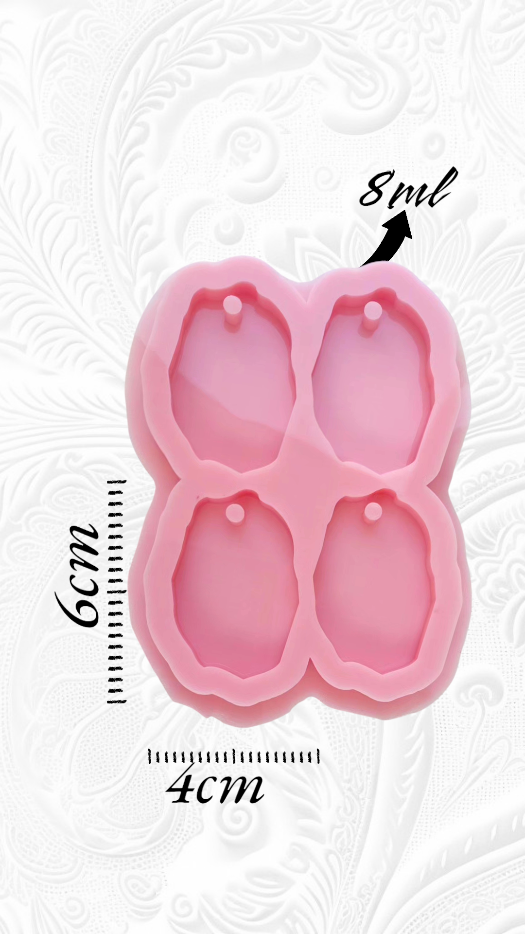This silicone mold has four cavities and is designed for crafts, resin casting, wax casting, and pottery. It is used in making keychains and pendants. size 6*4cm