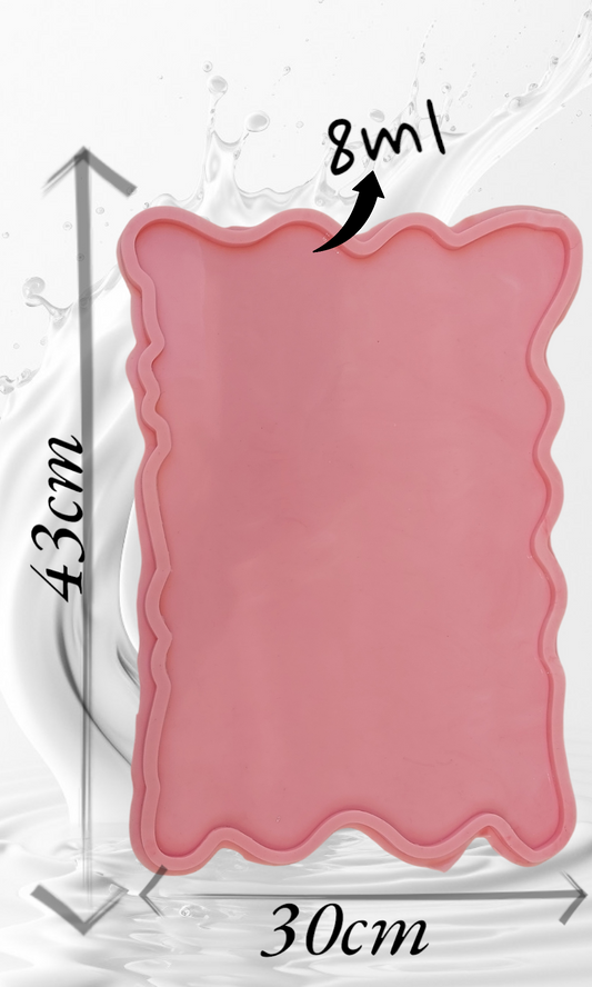 A rectangular silicone mold with irregular, wavy edges, commonly used for making trays and crafts such as casting resin, plaster, or pottery. Dimensions: 43*30 cm, Depth: 8 mm