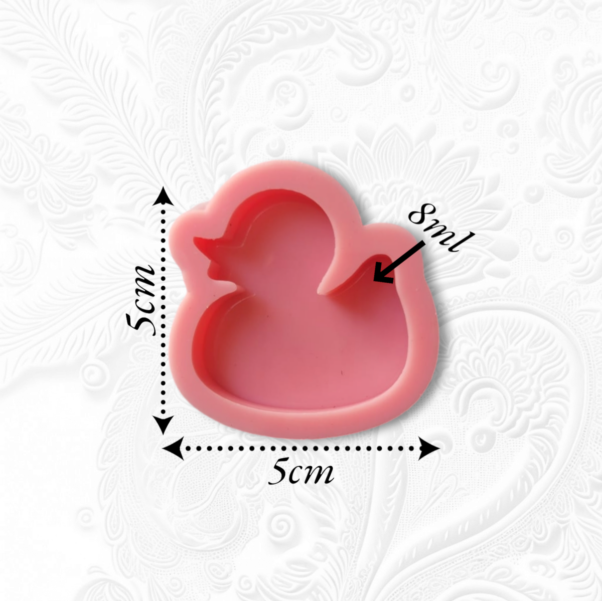A silicone mold used for casting resin, wax, plaster, or pottery. Designed in the shape of a duck, this mold is great for making small, elegant coasters, pendants, or decorative pieces. Size: 5 x 5 cm
