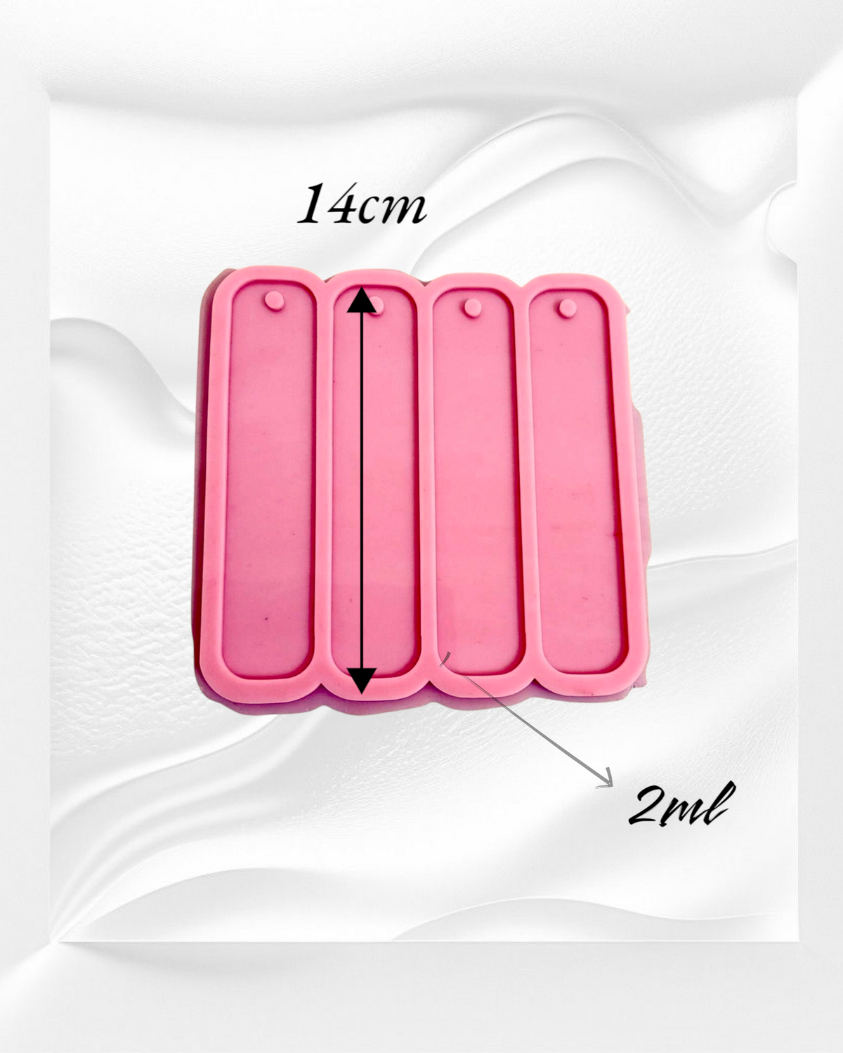 A silicone mold specially designed for making bookmarks using resin, wax, plaster, or ceramic; it contains four cavities in one mold. size 14cm