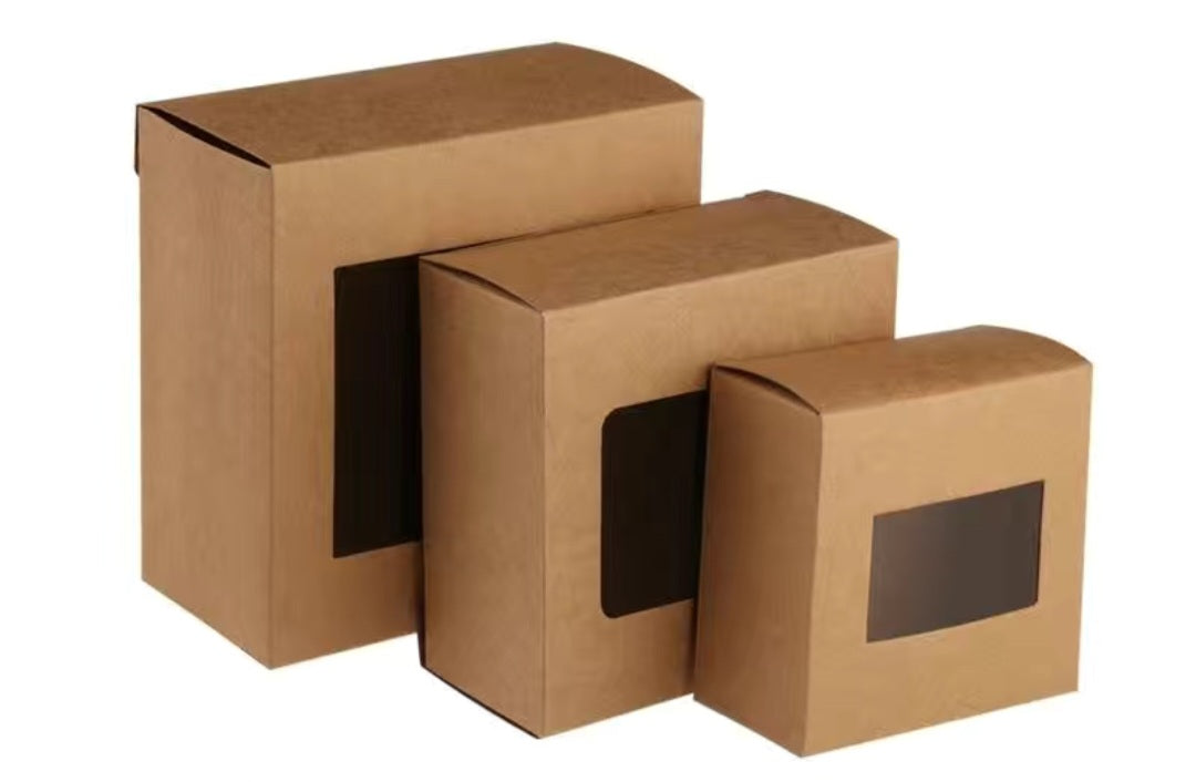 A luxurious and practical collection of packaging boxes made from natural kraft paper, featuring a transparent rectangular window that allows the products inside to be clearly and attractively displayed without the need to open the box