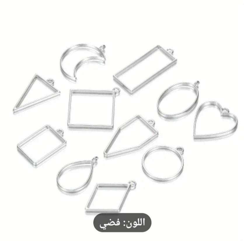 A set of open metal resin frames, which are hollow metal molds used primarily in the manufacture of jewelry and medals using resin