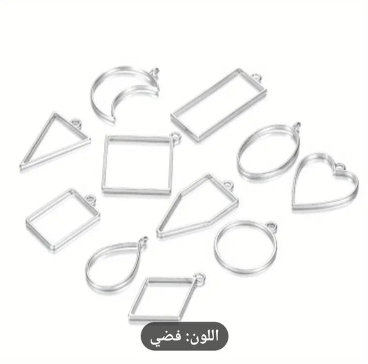A set of open metal resin frames, which are hollow metal molds used primarily in the manufacture of jewelry and medals using resin