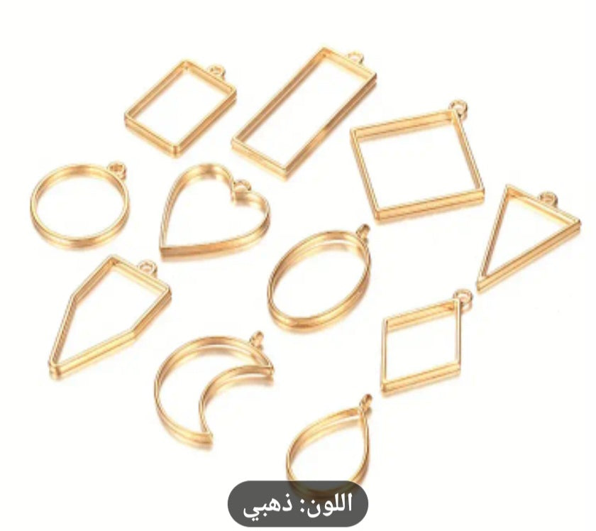 A set of open metal resin frames, which are hollow metal molds used primarily in the manufacture of jewelry and medals using resin