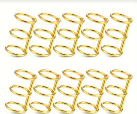 A set of three integrated metal binding rings used for collecting papers and notes, and is very popular in crafts for making notebooks, diaries, or custom photo albums using resin or acrylic covers